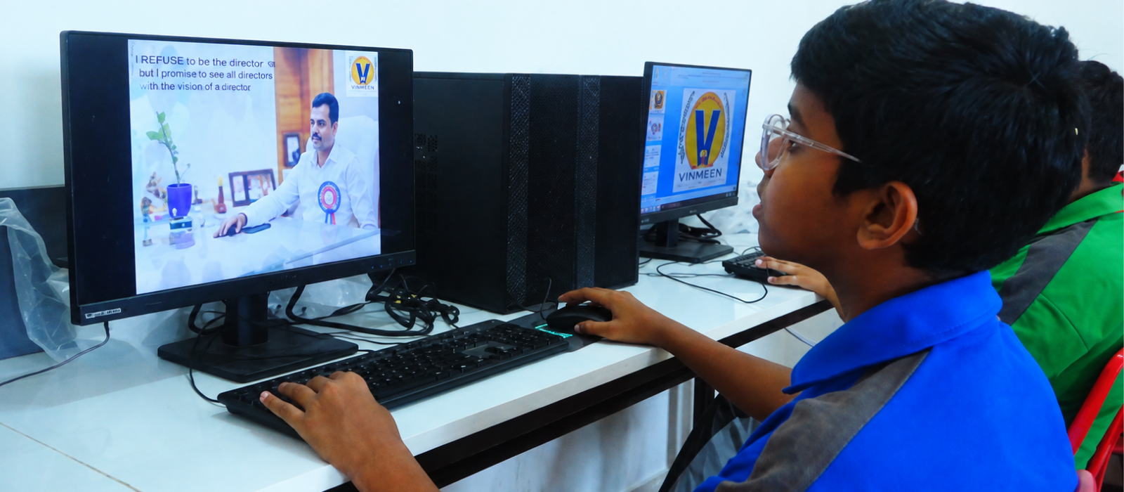 Student using computer in digital lab